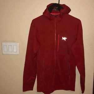 Men’s size small Zip up Arc’teryx sweater flawed